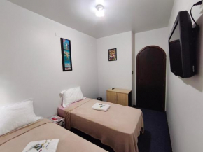 Quarto econômico DUPLO com AR